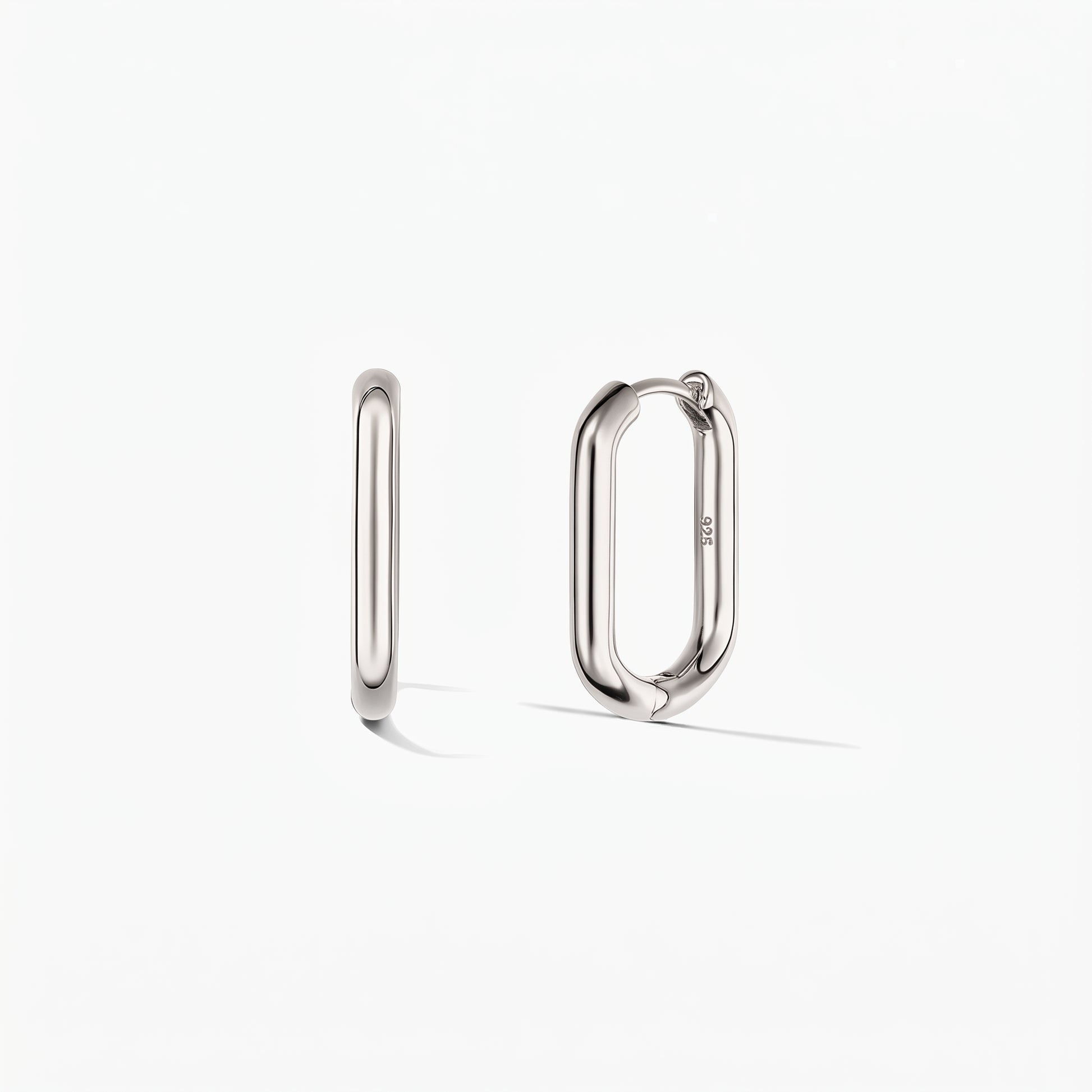 Pair of silver square hoop earrings on a white background, one shown from the side and one slightly open to reveal the hinged clasp.