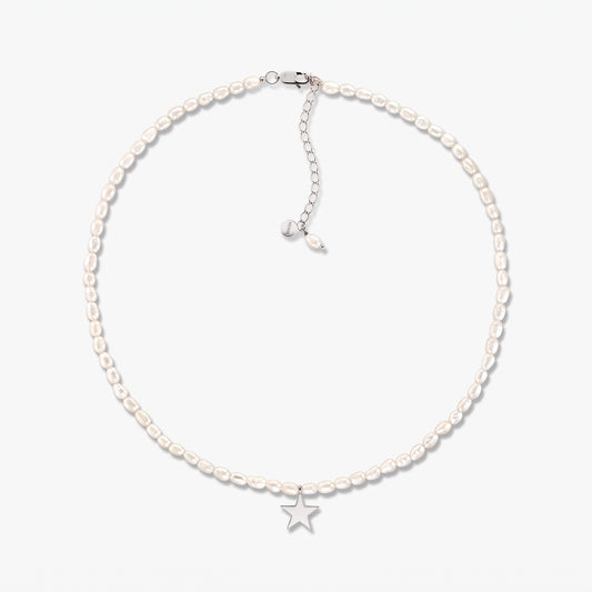Tiana sterling silver necklace with cultured pearls and a small star pendant, displayed on a white background with an adjustable extender chain.
